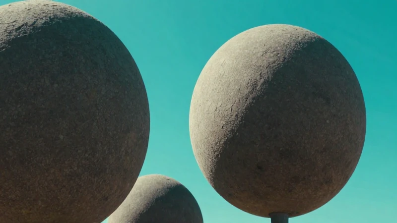 Rocas esféricas resalten contra cielo turquesa vibrante